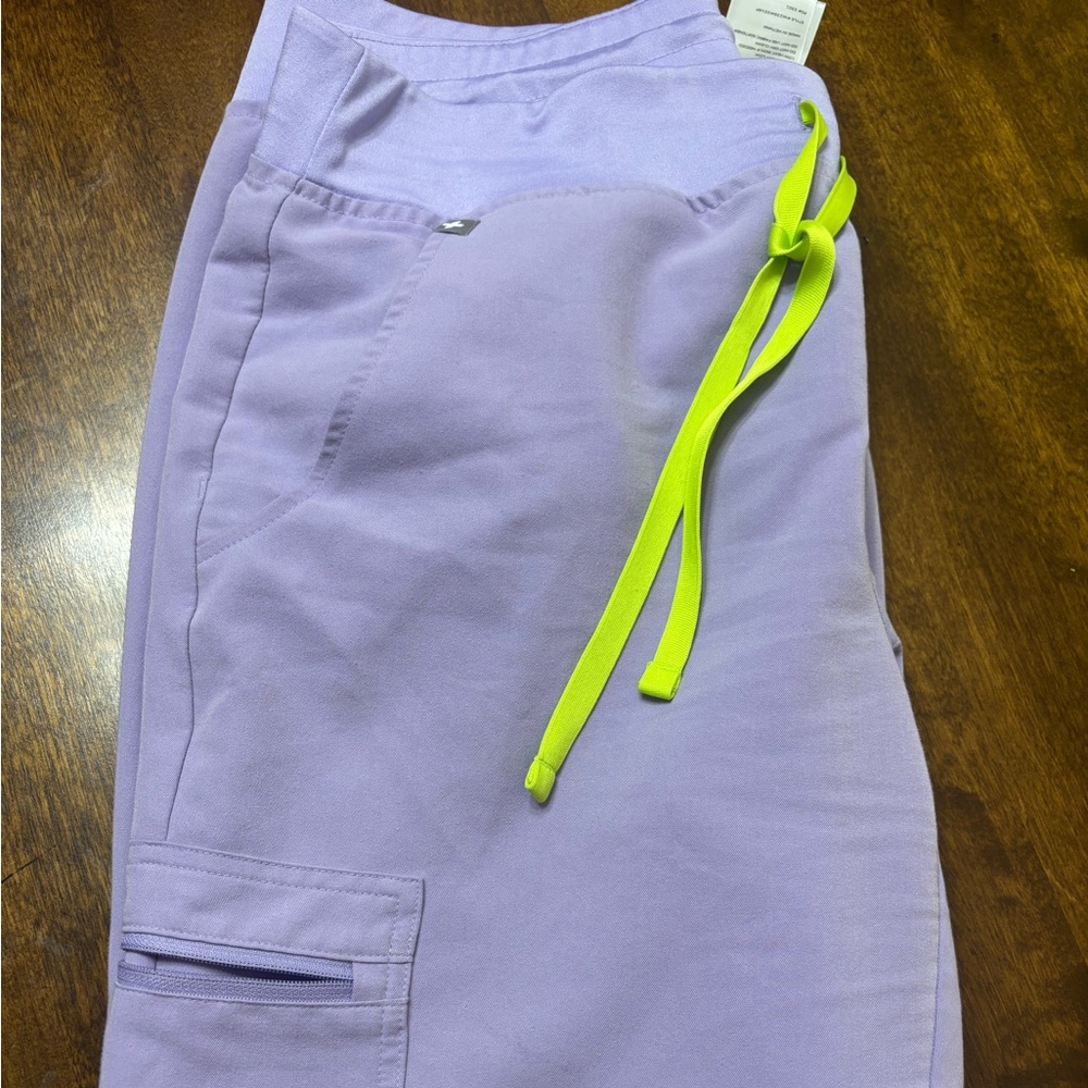 Gorgeous used lilac FIGS scrubs needing TLC medium petite pants/small top.